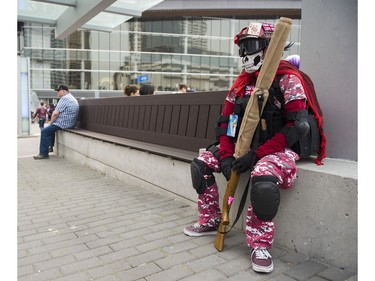 VANCOUVER. August 04 2017. Thomas Eng, dressed as Ghost from Call of Duty, takes a break outside the Anime Revolution Summer convention at Canada Place August 04-06, Vancouver, August 04 2017.  Gerry Kahrmann  /  PNG staff photo) ( Prov / Sun News ) 00050173A  [PNG Merlin Archive]
Gerry Kahrmann, PNG