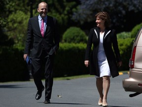 FILE PHOTO Premier Christy Clark arrives with her Chief-of-Staff Mike McDonald before a provincial cabinet swearing-in ceremony at Government House in Victoria, B.C., on Monday, June 12, 2017.