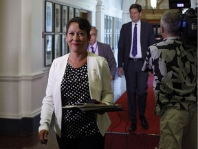 FILE PHOTO - NDP MLA Melanie Mark arrives to the start of the debate at B.C. Legislature in Victoria, B.C., on Monday, June 26, 2017.