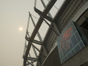 Wildfire haze obscures the sun over BC Place,  Vancouver, August 04 2017.