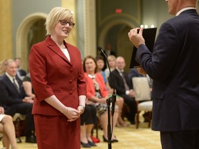 Delta MP Carla Qualtrough is sworn in as Minister of Public Works and Procurement during a ceremony at Rideau Hall in Ottawa on Monday.