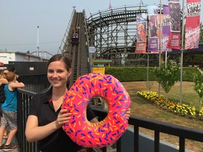 Upbeat Lisa Modica-Amore, the new director of Playland Operations, played along Wednesday in helping to promote the third annual PNE Donut Dash 5K Run, which is scheduled for Sunday, Aug. 20.