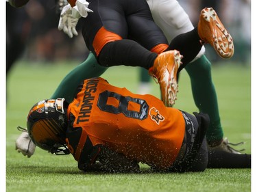 BC Lions #8 Anthony Thompson rolls with the ball after an interception against the  Saskatchewan Roughriders in a regular season CHL football game at BC Place Vancouver, August 05 2017.