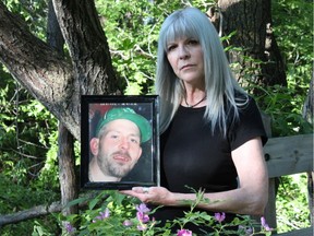 Christine Harris holds a photo of her son Lindsey Longe, whose 2012 death in supportive housing in Vancouver was not discovered for four days.