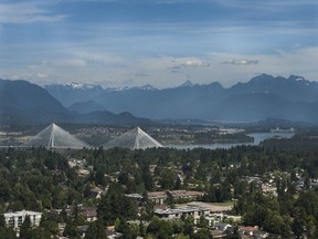 FILE PHOTO - View of the Port Mann bridge from the top floor of the 55-story Civic Hotel in Surrey, BC Wednesday, July 26, 2017.