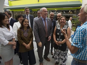 Premier John Horgan is joined by fellow NDP MLAs in Vancouver on Friday to announce the next steps in restoring the B.C. Human Rights Commission.