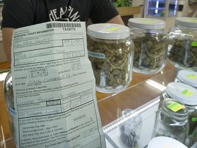 Vancouver, B.C.: A 2016 file photo shows a ticket issued to a Vancouver cannabis dispensary for operating without a business license.