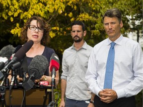 Dr. Reka Gustafson, medical health officer of Vancouver Coastal Health, Michael Wiebe of the Vancouver Park Board Chair and Vancouver Mayor Gregor Robertson (left to right) at Tuesday’s news conference on the poor air quality caused in large part by smoke from the Interior wildfires.