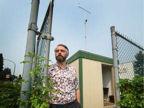 Metro Vancouver's Kyle Howe at an air-quality testing station in Burnaby on Tuesday.