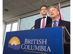 The first phase of the regulatory and legal assault on the Kinder Morgan pipeline was outlined at a Thursday news conference in Vancouver by Environment Minister George Heyman, right, and Attorney General David Eby.