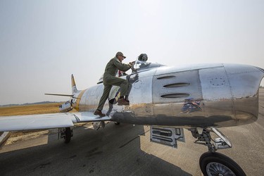 An F-86 pilot gets ready for a flight at Abbotsford International Air Show on Friday. It continues until Sunday.