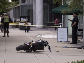 British Columbia's workplace safety agency has released the first official account of a "Deadpool 2" stuntwoman's death, saying SJ Harris was thrown off a motorcycle and propelled through a plate glass window. A motorcycle lays on its side on the sidewalk after a stunt went wrong on the set of Deadpool 2 in Vancouver, BC, August, 14, 2017.