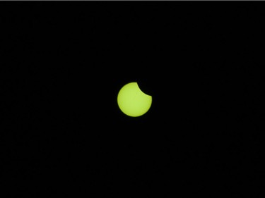 The solar eclipse at 09:24 seen in Vancouver, August, 21, 2017.