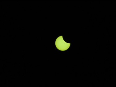 The solar eclipse at 09:34 seen in Vancouver, BC, August, 21, 2017.