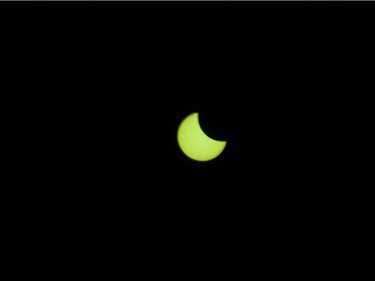 The solar eclipse at 09:43 seen in Vancouver, BC, August, 21, 2017.