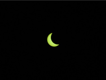 The solar eclipse at 10:03 seen in Vancouver, BC, August, 21, 2017.