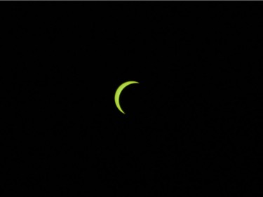 The solar eclipse at 10:21 seen in Vancouver, BC, August, 21, 2017.