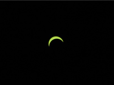 The solar eclipse at 10:30 seen in Vancouver, BC, August, 21, 2017.