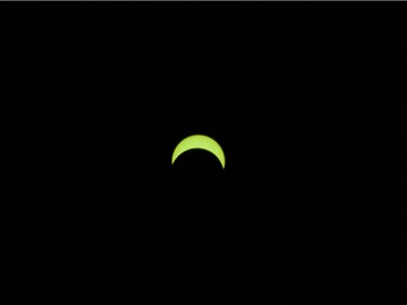 The solar eclipse at 10:40 seen in Vancouver, BC, August, 21, 2017.