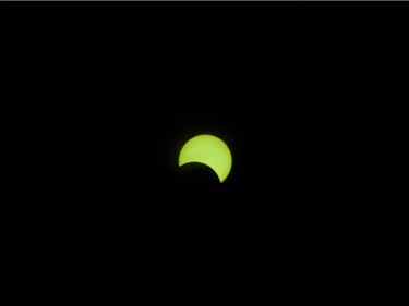 The solar eclipse at 11:03 seen in Vancouver, BC, August, 21, 2017.