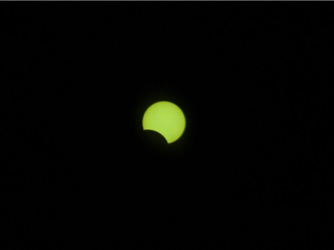 The solar eclipse at 11:20 seen in Vancouver, BC, August, 21, 2017.