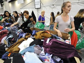 Shopping chaos ensues at the annual Aritzia Warehouse Sale

VANCOUVER, BC., August 30, 2017 -- Scenes of shopping frenzy chaos at the annual Aritzia Warehouse Sale at the Vancouver Convention Centre  in Vancouver, BC., August 30, 2017. (NICK PROCAYLO/PostMedia)  00050432A ORG XMIT: 00050432A [PNG Merlin Archive]
Nick Procaylo, PNG