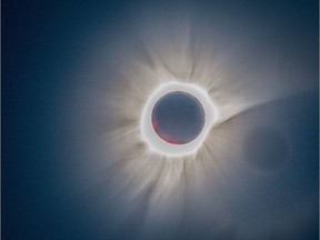 The totally eclipsed sun showing plasma streamers over the Java Sea in March 2016.