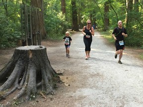 Adam Goluboff, right, passes Sylvie and Renata Hamana during Sunday's MEC Trail Race No. 5 in Burnaby's Central Park. More than 425 runners took part in the 10K and 5K races.