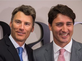 Vancouver Mayor Gregor Robertson and Prime Minister Justin Trudeau get up close prior to their private meeting in Vancouver on Tuesday.