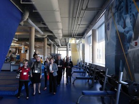 Media and guests tour the fitness building at the University of Victoria in a 2015 file photo.