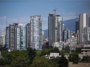 The Real Estate Board of Greater Vancouver says
demand continues to be high for condominiums and townhomes in the
region, but less so for detached properties.