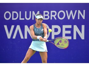 Carol Zhao of Richmond Hill, Ont., hits a return to former world No. 12 Yanina Wickmayer in the second round at the Odlum Brown VanOpen tournament at the Hollyburn Country Club in West Vancouver on Thursday. -- Bo Mon Kwan photo [PNG Merlin Archive]

kCzvaj0ATfKlAgzR+4L6TA
B.M.Kwan, PNG