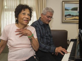 With husband Ken Verhoven at the piano, Gladys Verhoven sings the couple's wedding song "Always be loving you".