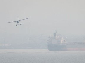 Float Plane

Smoke from wildfires burning in central British Columbia hangs in the air as a seaplane prepares to land on the harbour near the bulk carrier Nanakura, in Vancouver, B.C., on Thursday August 10, 2017. THE CANADIAN PRESS/Darryl Dyck ORG XMIT: VCRD117
DARRYL DYCK,