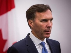 Minister of Finance Bill Morneau speaks to media during a press conference in Vancouver, B.C., on Tuesday September 5, 2017. THE CANADIAN PRESS/Ben Nelms