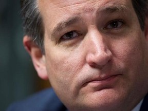 In this May 10, 2017 file photo, Sen. Ted Cruz, R-Texas., questions witnesses during a Senate Judiciary Committee hearing on Capitol Hill in Washington. Cruz says an aide was responsible for the &ampquot;like&ampquot; that caused a pornographic post to briefly appear on Cruz&#039;s Twitter feed overnight. (AP Photo/Cliff Owen)