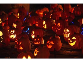 Halloween Jack-o'-lanterns light up the night.