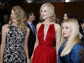 Laura Dern, from left, Nicole Kidman, and Reese Witherspoon arrive at the 69th Primetime Emmy Awards on Sunday, Sept. 17, 2017, at the Microsoft Theater in Los Angeles.