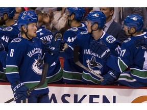 Las Vegas Golden Knights v Vancouver Canucks VANCOUVER, BC - SEPTEMBER 17: Brock Boeser #6 of the Vancouver Canucks celebrates with teammates after scoring a goal against the Las Vegas Golden Knights in NHL pre-season action on September 17, 2017 at Rogers Arena in Vancouver, British Columbia, Canada. (Photo by Rich Lam/Getty Images) ORG XMIT: 775028249 Rich Lam, Getty Images