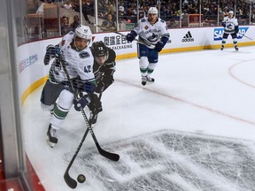 Vancouver Canucks' Alexander Burmistrov attacks the puck during the 2017 NHL China Games in Shanghai on Thursday.