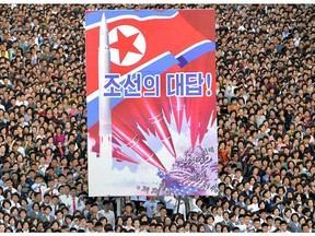 This picture taken on September 23, 2017 and released from North Korea's official Korean Central News Agency (KCNA) on September 24 shows an anti-US rally in Kim Il-Sung Square in Pyongyang. Tens of thousands of Pyongyang residents gathered in the capital's Kim Il-Sung Square on September 23 to laud leader Kim Jong-Un's denunciation of US President Donald Trump.
