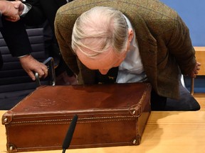 A leader of the Alternative for Germany, Alexander Gauland, takes his seat before addressing a press conference on the day after the German General elections on September 25, 2017 in Berlin.