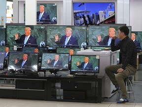TV screens show a news program with an image of U.S. President Donald Trump in his address at the U.N. General Assembly, at the Yongsan Electronic Market in Seoul, South Korea, Wednesday, Sept. 20, 2017