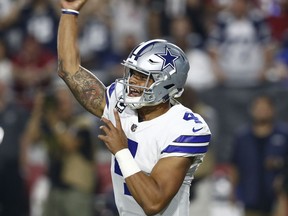 Dallas Cowboys quarterback Dak Prescott throws against the Arizona Cardinals during the first half of an NFL game on Sept. 25, 2017, in Glendale, Ariz.