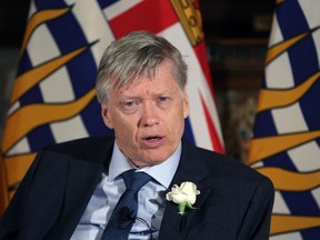 Sam Sullivan speaks to media following a swearing-in ceremony for the provincial cabinet at Government House in Victoria, B.C., on Monday, June 12, 2017.
