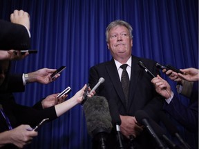 Liberal MLA Rich Coleman takes questions from media at the Legislature in Victoria on Friday, Sept. 8, 2017.