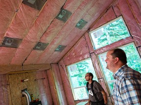 Nathan Stone (right), co-founder of building development company Odessa Group, credits his involvement in the Local Energy Efficiency Partnership (LEEP) program for helping him learn innovative building techniques to make his homes even more efficient.