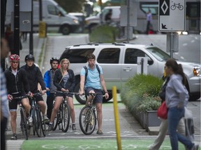Cyclists on Hornby Street bike lane in Vancouver