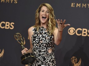 Laura Dern poses in the press room with the award for outstanding supporting actress in a limited series or movie for "Big Little Lies" at the 69th Primetime Emmy Awards on Sunday, Sept. 17, 2017, at the Microsoft Theater in Los Angeles. (Photo by Jordan Strauss/Invision/AP)