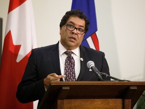 Calgary Mayor Naheed Nenshi speaks as the provincial government reveals details of new city charters for Edmonton and Calgary at the Alberta Legislature Building in Edmonton on Thursday, Aug. 10, 2017. (Codie McLachlan/Postmedia)